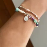 Pulsera artesanal con amatista, amazonita y perlas con medalla de plata 950 - Pilar Segura Orfebre