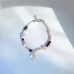Pulsera María Paz con granate y cuarzo rosa hecha a mano terminaciones plata 950