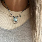 Collar de piedras naturales en tonos azules con larimar y flor de plata 950 - colección Pilar Segura