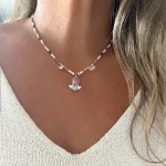 Collar con rodocrosita natural engarzada en plata 950 con hojas caladas, turmalinas y perlas cultivadas