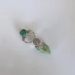 Colgante Jardín del Corazón con piedras naturales y flores caladas a mano en plata 950 Chile
