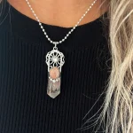Talismán de plata 950 con cuarzo rutilado y piedra sol natural, mándala calado a mano - Pilar Segura
