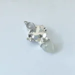 Talismán artesanal Renacer del Corazón con piedra luna y cuarzo rosa plata 950 Pilar Segura Orfebre