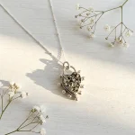 collar corazón pirita con detalles en plata