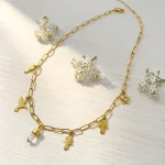 joya personalizada con colgantes en oro