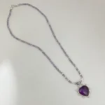 Collar artesanal ligero y elegante con corazón de amatista natural y terminaciones plata 950 Chile