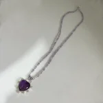 Joya artesanal femenina con amatista natural en corazón de plata 950 hecha a mano Chile