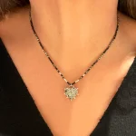 Joya artesanal con corazón de pirita natural y turmalinas negras en plata 950 - Pilar Segura Orfebre