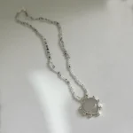 Collar de cuarzos y piedras lunas naturales con colgante corazón calado en plata 950 - Pilar Segura Orfebre