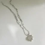Collar con corazón de cuarzo natural engarzado en plata 950, cadena de cuarzo y piedra luna Chile