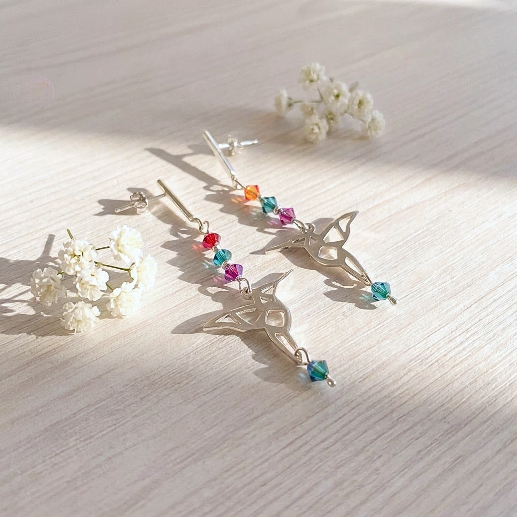 Aros colibrí con diseño origami y cristales Swarovski