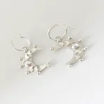 Aros artesanales Ciclos de Luz en plata 950 con luna, cristal Swarovski y lunas pequeñas - Pilar Segura Orfebre Chile