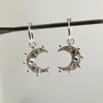 Aros artesanales luna creciente con pelotitas, lunas pequeñas y Swarovski plata 950 Chile Pilar Segura