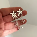 Aros de plata 950 con estrella artesanal, cristales Swarovski y cadenitas colgantes Chile Pilar Segura