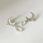 Aros artesanales únicos luna martillada con cuarzo cristal natural en gota plata 950 hecho a mano Chile