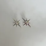 Aros Sendero de Luz artesanales estrella con Swarovski y plata 950 Pilar Segura Orfebre Chile