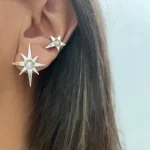 Aros Sendero de Luz hechos a mano en plata 950 con estrella calada y cristal Swarovski Chile