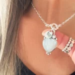 Colgante con piedra luna corazón y luna estrella envejecida en plata 950 artesanal Chile Pilar Segura Orfebre
