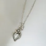 Colgante con piedra luna natural en corazón, luna estrella caladas y Swarovski en plata 950 artesanal Chile