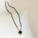Colgante corazón de turmalina negra natural en plata 950 con collar de turmalinas hilado a mano Chile