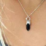 Colgante de plata 950 con ónix negro natural y cristal Swarovski, luna y estrella artesanal Chile Pilar Segura
