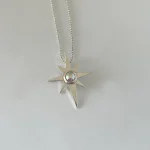 Collar Lucero de Luz hecho a mano en plata 950 con estrella calada y Swarovski iridiscente Chile