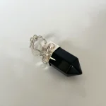 Talismán Portal de Luz artesanal con ónix negro y Swarovski plata 950 Pilar Segura Orfebre Chile
